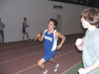 Theo Spencer running his leg of the 4x800 relay.
