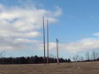 Disputed section of VELCO’s Northwest Reliability Project in New Haven. Existing 115 kv power transmission lines behind the poles for the new 345 kv lines.