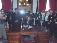 Governor Jim Douglas signs bill S.251 into law in Montpelier.