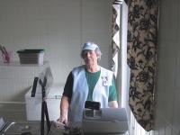 Mary Cauchon Pictured above volunteering in the hospital cafeteria.