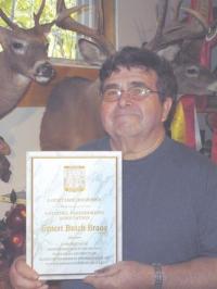Butch with his Lifetime Member Plaque presented by The National Taxidermists Association. Butch’s work can be seen on the web at braggstaxidermy.com.
