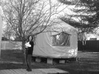 Kate Gridley shows one of the yurts erected by the students.