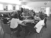 A seventh grade class meets right after morning meeting at the Gailer School.