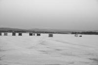 Fishing shanties North of the Crown Point Bridge. The Lake Champlain Ice Sheet can be fun to fish, but caution is always the best policy.