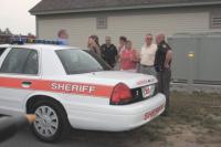 Members of the Addison County Sheriff’s Department visit with Probate Judge Misse Smith and other guests during the 60th Anniversary Celebration for the Vermont State Police at their new New Haven barracks on Saturday, August 25th, 2007.