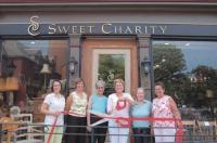 (L to R): Darcy Tarte of the Chittenden Bank and Chair of the ACCOC Publicity & Promotions Committee, Liz Markowski, Deanna Shapiro, Lizbeth Ryan, Jean Sweeney & Patty Paul.
The Addison County Chamber of Commerce helped new member Sweet Charity celebrate their grand opening on Friday September 7th with a ribbon cutting ceremony. An official grand opening celebration was held on September 9th.
Sweet Charity is an “Interesting Resale Shop” which is affiliated with Hospice Volunteer Services & Women of Wisdom, a philanthropic group consisting of 12 women. The shop accepts home goods such as couches, tables, estate jewelry, dishware, tables, bureaus, chairs, throw rugs, rockers, mirrors, art works, dishes, puzzles, games, linens, glassware, as well as other various home goods. They are able to arrange for pickups but are grateful when things can be delivered.
Sweet Charity is open Monday through Saturday from 9:30am-5:30pm and is located at 141A Main Street in Vergennes. For more information, please call 877-6200.