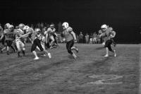 Tigers Ben Almquist #4 gets a full head of steam as he heads for the corner behind #36 Chad Foley who is blocking Bratts #36 Alex Bristol while Tiger #8 Taylor Ryan lines up another colonel further up-field. The Tigers won the important D-1 contest 28-0 in MIddlebury and are now 6-0 in ‘07.
