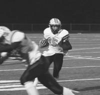 Tiger Sophomore Ryan Foley cuts off a black during Middlebury’s 35-13 win at Burlington on Friday night, October 12th, 2007. The Tigers are in the post-season with 2 games left on the schedule.