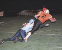 Tiger quarterback Sam Jones scores a T.D. in Middlebury’s semifinal loss to South Burlington on Friday night, November 2nd, 2007. The final score was 27-23 Rebels.