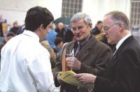 Moderator (and Governor) James Douglas (right), attorney Karl Neuse (center) and Assistant Town Manager Joseph Colangelo go over a few points before Middlebury's Town Meeting.