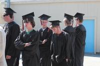 Grads share a light moment during 2008 MUHS graduation rehearsed at the Memorial Sports Center on Saturday June 14th, 2008.