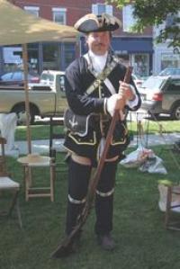 Members of Les Troupes de la Pointe a la Chevelure (Crown Point Troop Reenactors) in authentic period costuming add historical authenticity to the French Heritage Day celebration held in Vergennes on July 12th and 13th.