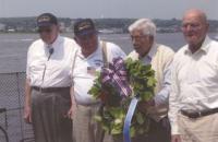 WWII Veterans Andrew Johnson, Winston W. Whitten, Fernando Cuevas and Raymond Fulleman place a wreath on the ocean in memorial to the tanker Mississinewa and her crew. The tanker was torpedoed on November 22, 1944.