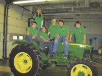 Students in the Hannaford Career Centers Mechanical Science class learn basic
safe tractor operation skills. Pictured on the one of the tractors on loan from Hendy
Bros that they completed their safety course on are Ramsey Bronson, Ashley
Howlett, Joey Zeno, Brittany Clark, Austin Quesnel and Tyler Kimball