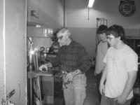 Mechanical Science instructional aid Tom Tresh demonstrates safe drill press skills
to Hannaford Career Center students Austin Quesnel and Tyler Kimball.