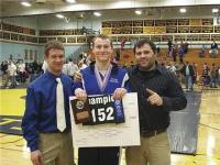 Assistant Coach Scott Bissonnette,
Senior & State Champion Bobby Worley,
and Coach Nate Kittredge pause to
celebrate Bobby's state win at the
Vermont Wrestling State Championships