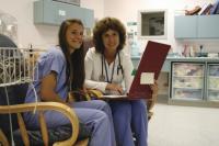 LtoR Sarah Hawkins, a Junior at Black River High School in Ludlow looks over notes and data with Mona Rickert R.N. at RRMC’s Newborn Nursery.  Sarah says that she finds her TIPS experience “Amazing. I like it so much.  The hands-on interaction is very special for me.”  TIPS Program Coordinator Cathy Pratico R.N. introduced The Valley Voice to this exceptional program. 