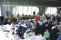 Helen Porter Residents enjoy some Irish music provided by the popular Middlebury group Oh’Anleigh during a mid-day cruise on Lake Champlain. The cruise was a highlight for Helen Porter residents and is being  funded by a lake long paddling project currently at the halfway point. The trip was also recognized as an official 2009 Lake Champlain Quadricentennial event. Follow the paddlers in the Voice.