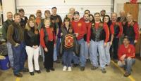 Pictured here are some of the forty members of Vermont Chapter # 4 of the Red Knights, sharing a love of motorcycles, community and a bond of being firefighters.