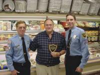 Greg's Market is awarded a Community Service Award for their long time support of the Middlebury Community from members of the Middlebury Volunteer Fire Department from left to right David Broughton, Greg Wry, and Josh Newton. Congratulations to Greg and his staff.