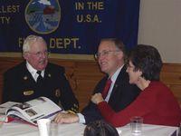 Chief Jackman discussing the needs of Vergennes Fire Department with Governor Douglas and his wife.