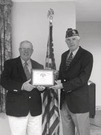 Bob Jenkins receives the American Legion Post 14 Citizenship Award from Legion member John Mitchell.
