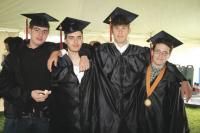 MUHS Grads L to R: Sean Higgins of Ripton, Alex Kansky of Middlebury, Daniel Boucher of Middlebury and Dana Desautels of Salisbury enjoy some breakfast before the Middlebury Union High School 2010 Commencement at the Memorial Sports Center.