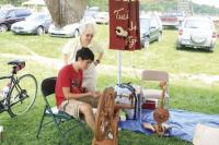A member of the Twist O’Wool Guild guides a spinner through the process of spinning. Wool and sheep are as Vermont as maple syrup. The art of making woolen products in Vermont has a history over 200 years old.