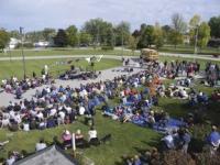 Spread out across the front lawn of the school, six hundred watched, listened and participated in the Peace One Day event.