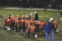 MUHS head football coach Dennis Smith talks with his team after the Tigers defeated Fair Haven and punched their ticket to the VT State Title High School Football Game in Division 2 against Rice. The Tigers remained undefeated with their win 9-6 on Friday night, November 5th, 2010 at Doc Collins Field.