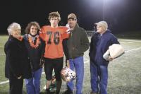 #76 Sr. Co-Capt Patrick Fifield and members of his family took time for a photo after the Division 2 Vermont State Championship game awards ceremony held at Spartan Stadium on the campus of Castelton State College on Saturday evening November 13th 2010. The Tigers lost their first game of the season to Rice Memorial High of So. Burlington and ended the campaign 2010, 10-1. The Tigers will be sending several players to the annual North South Senior Football Classic to be played at this same field on Saturday November 20, 2010. Patrick had excellent seasons for the Tigers and is likely an all-state-candidate.