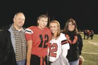 #12 Tiger Sr. Quarterback Brendan Burrell with his parents and girlfriend took time for a photo after the Division 2 Vermont State Championship game awards ceremony held at Spartan Stadium on the campus of Castelton State College on Saturday evening November 13th 2010.  Brendan has had excellent seasons for the Tigers and is likely an all-state-candidate.