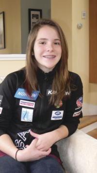 Mary Hogan 6th grade student Gracie Weinberg wears her new Luge Olympic Team jacket as she gets ready to pack and go to Lake Placid to continue her formal Luge Training.