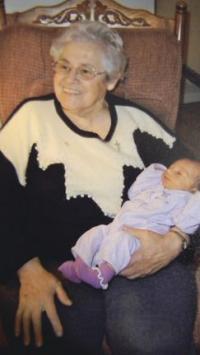 Holding her third great-great granddaughter, Bertha Perron celebrates family and yet another generation in the Champlain Valley.