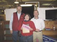 Sheila Tarpin was the third prize winner with a total of 3-million purchase points  at Kennedy Brothers in Vergennes. Win and Graeme congratulate her. 
