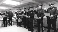 Vergennes Police Officers present for the award ceremony and seen here renewing their oaths as police officers were Chief George Merkel , Sergeant Patrick Greenslet, Officer Jason Ouellette, Officer Brent Newton, Officer Bill Wager, Officer Rejean LaFleche, Officer Robert Worley, Officer Neil Mogerly, Chaplain, Father Yvon Royer.