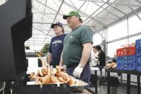 Agway's Master Grillers at work preparing food during the Agway Annual Spring Open House.