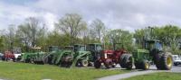 Tractor row in the VUHS parking lot testifies to the equipment use and cost for farmers of being in the farming business.