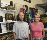 Green Mountain Pet & tack owner Zev Langenauer and Donna Baldwin stand amidst the tack and clothing available at the new Route 7 location in Ferrisburgh.