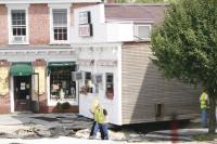 One of Addison Counties most popular eateries was moved from its foundation during heavy rain and flash flooding from Tropical Storm Irene. The Neshobe River tore through the village damaging this building and several others and ripped away chunks of concrete off the Rt. 7 bridge.  Markowski Construction was leading the effort to return traffic through town on Wednesday, Aug. 31st.