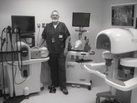 Dennis Maloney displaying some of the equipment used for surgical training in the Virtual Reality Room at the Clinical Simulation Lab.