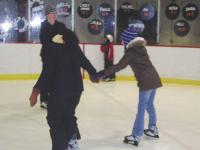 Hunter and Maddy Smith skating with Brianna Watson at the ice rink in Middlebury over Christmas break.