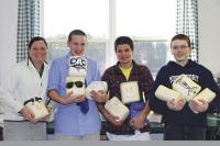 LtoR: Teacher Liz Cronin, Johnny Fitzcharles, Ali Adul Sater and Holden Laroche all of whom participated in the flour baby project.