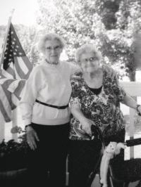 Using a walker for balance, (she calls it her Cadillac) Viola gets around every day and is seen here with her sister Margorie before going for a walk in the Vermont summer sun!