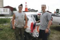 The Hastings brothers (LtoR) Marshall and Jonas prepare for the 2012 Demolition Derby at Addison County Fair & Field Days. The “demo” car used to be Marshall’s. The brothers were confident that they would do well.