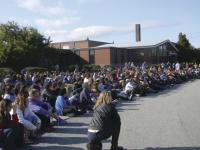 Gathered for Peace One Day, the entire school population heard the words, music and reflections of adults and students around the theme of choice, service and peace.