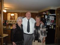 Seen here with Rita Armell and Gisele Sabourin at a 2011 wedding, Greg officiated for granddaughter Michelle, it is easy to see his love of people and humor