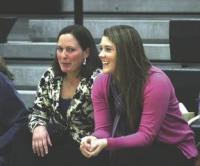 Coach Emilo (L) and Coach Nienow (R) watching their team play.