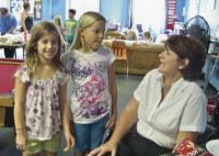 Rep. Diane  Lanpher laughing with some of her youngest constituents at the Boys & Girls Club!