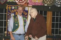 Doctor Ray Collins receives his 60 year pin from King Lion Roger Desabrais Jr. at a recent Middlebury Lion’s Club ceremony. 